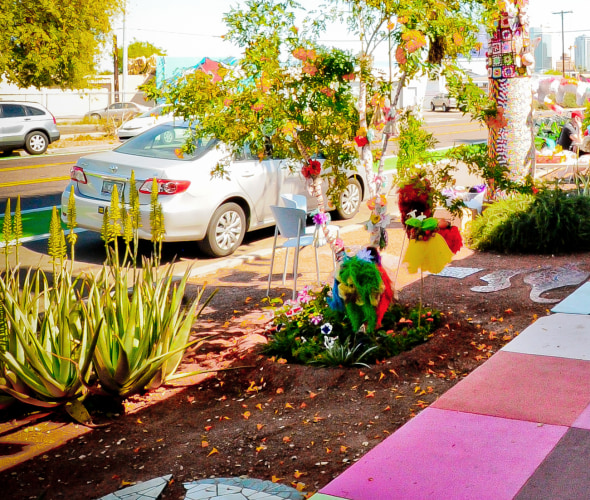 festive decor lines a sidewalk near Bragg's Pie Factory in Phoenix, Arizona, picture