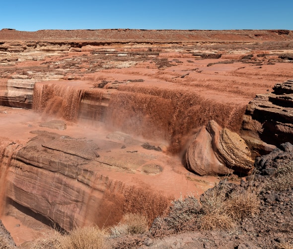 Indulge in the Painted Desert's Rare Chocolate Falls