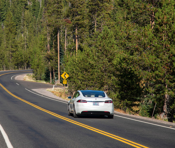 A Tesla on a highway outside of Bend, Oregon.