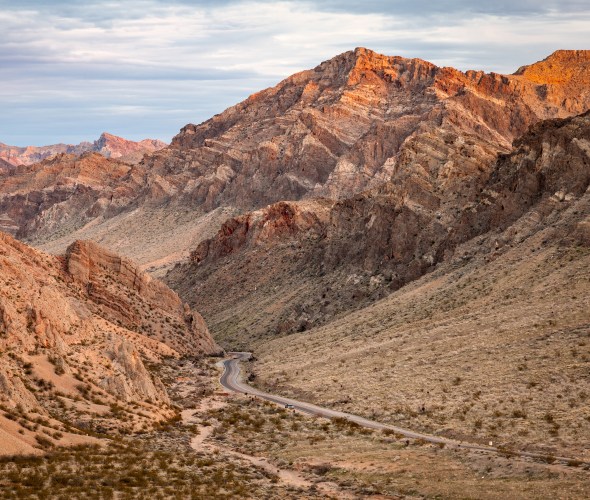 A road cuts through the mountains in Valley of Fire State Park in Southern Nevada.