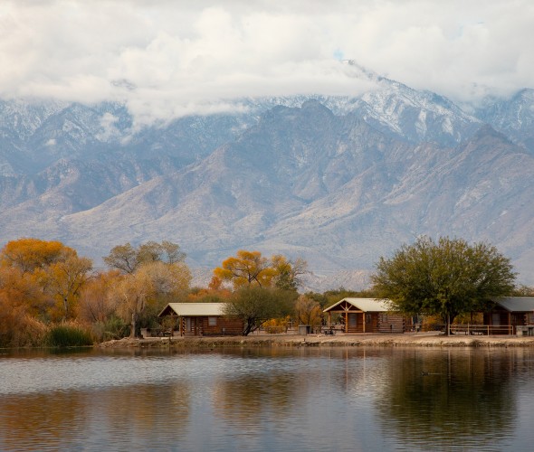 Snow in the mountains above the cabins at Kartchner Caverns State Park Campground in Benson, Arizona.