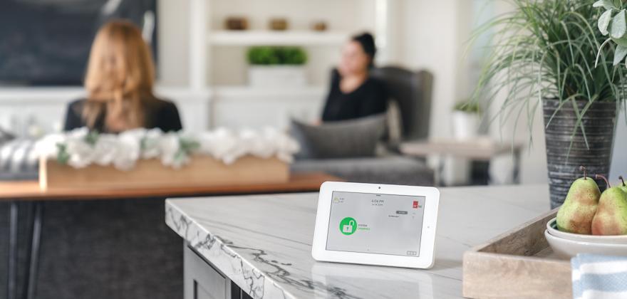 AAA Smart Home Security control panel sitting on a countertop.