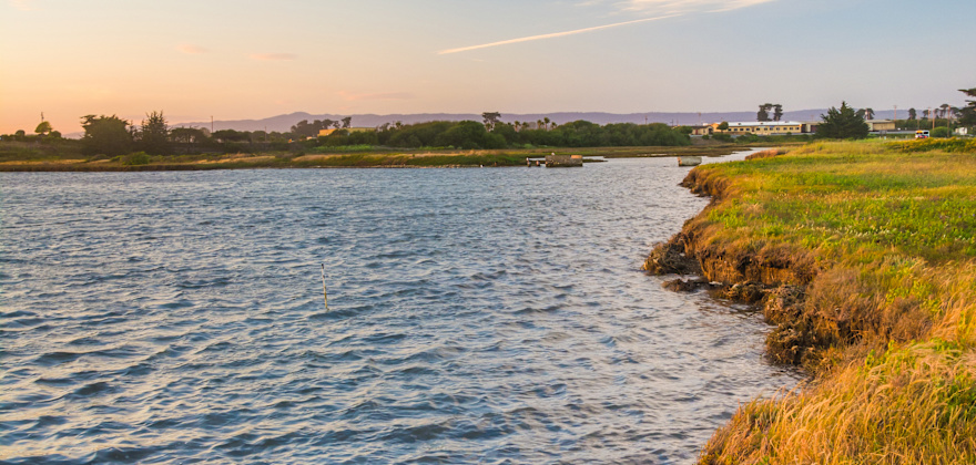 Sunset over a marsh at Moss Landing State Park, California.