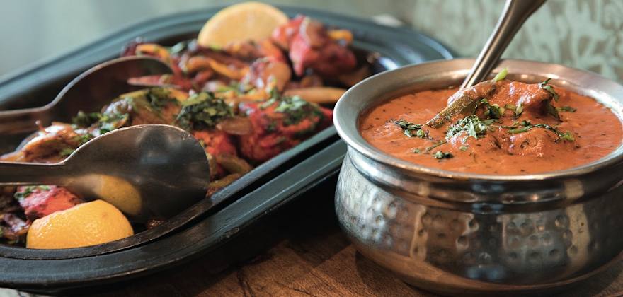 chicken tikka two ways—on a sizzling platter or in a saucy bowl—at Tandoori Oven in Logan, Utah, picture