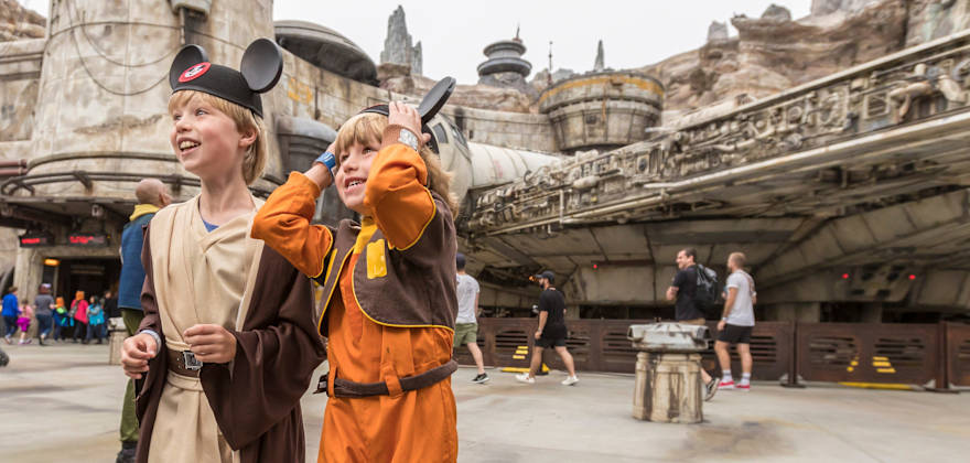 Brothers stand in Disneyland Resort's Star Wars: Galaxy's Edge.