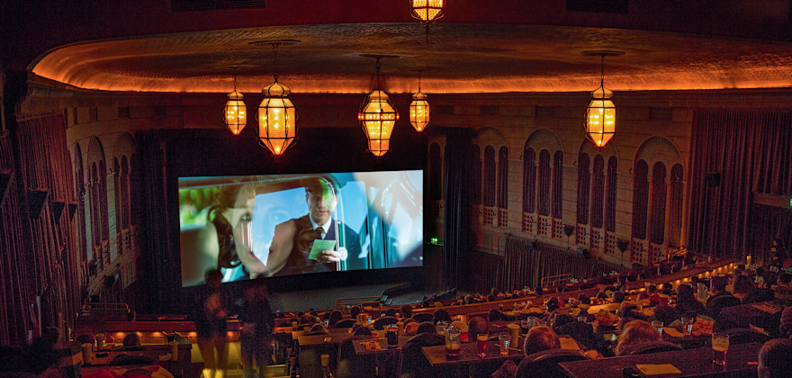 Portland's Bagdad Theater & Pub interior during movie screening