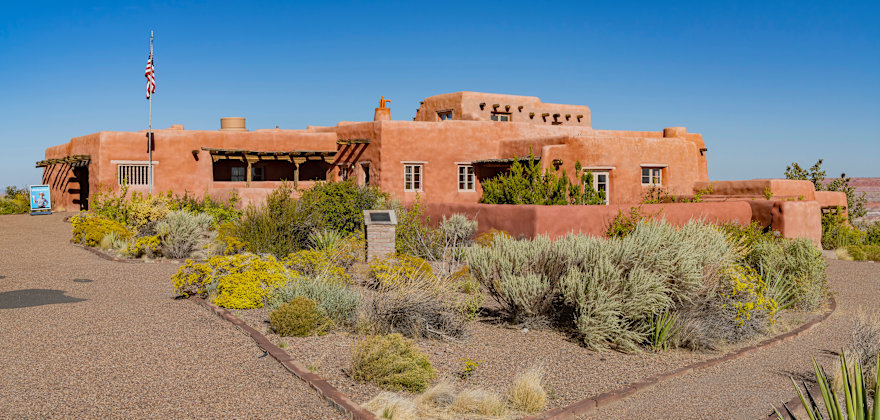 The adobe Painted Desert Inn in Petrified Forest National Park on a clear day.