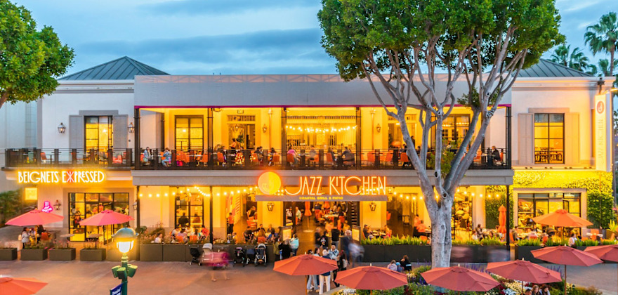 People sit outside the Jazz Kitchen Coastal Grill & Patio in Downtown Disney District.