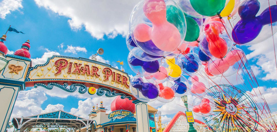 Balloons outside the pixar pier sign at Disneyland Resort's California Adventure.