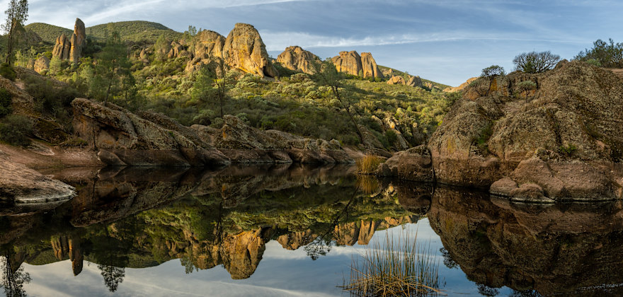 Bear Gulch Reservoir in Pinnacles National Park on a party cloudy day.