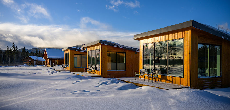 Snow-covered grounds of the Northern Lights Resort & Spa in Yukon, Canada.