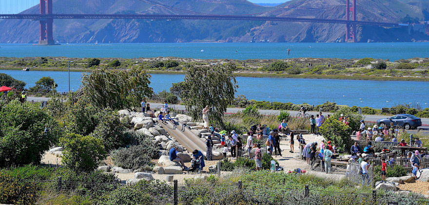 Families play at the Presidio Tunnel Tops in San Francisco, California.