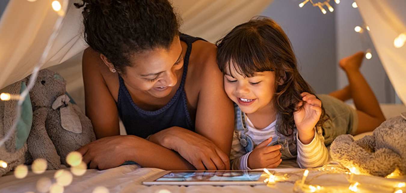 a AAA Member with home insurance spends time with her daughter