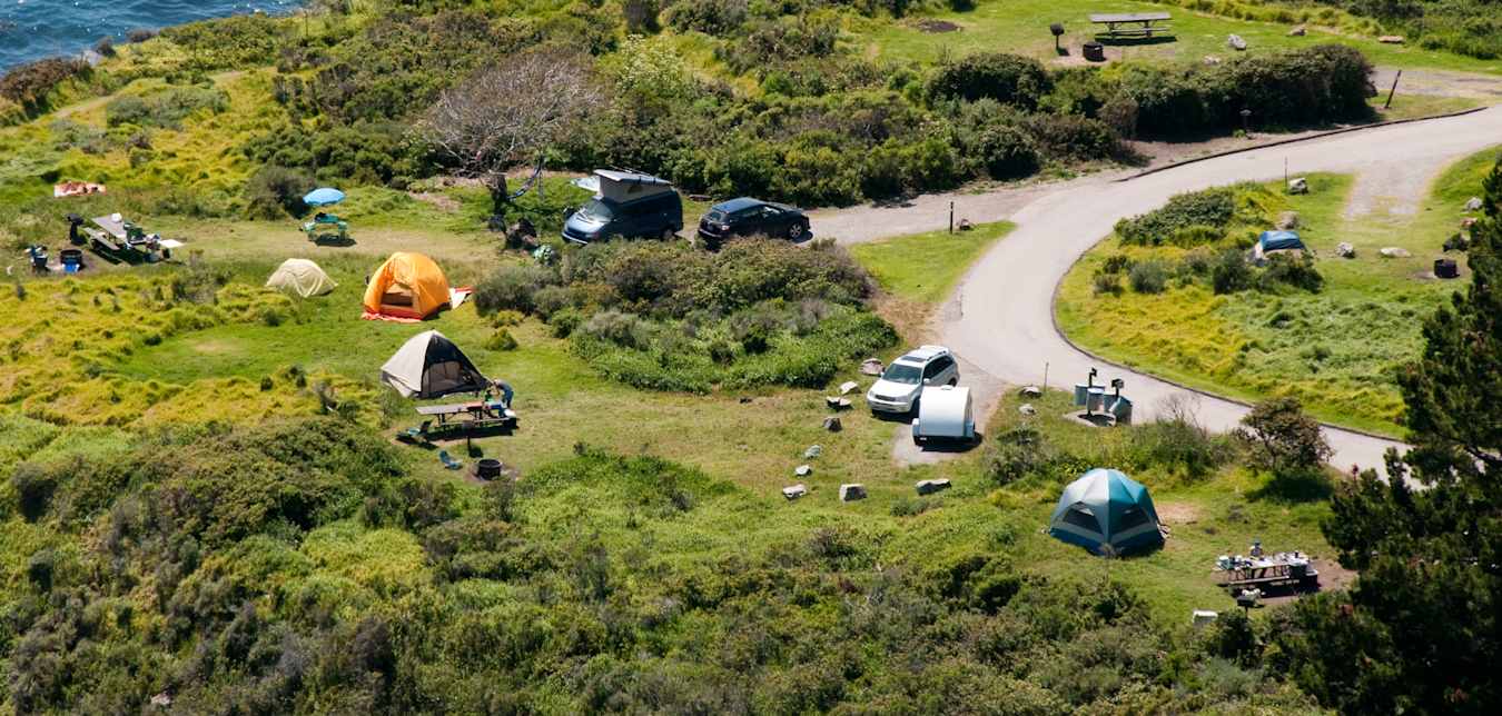 Aerial view of tents set up at Kirk Creek Campground in Los Padres National Forest near Big Sur, California.