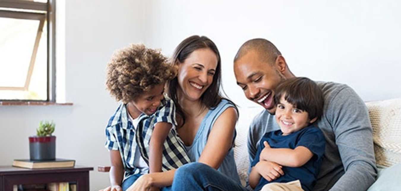 Family in a house covered by AAA Insurance