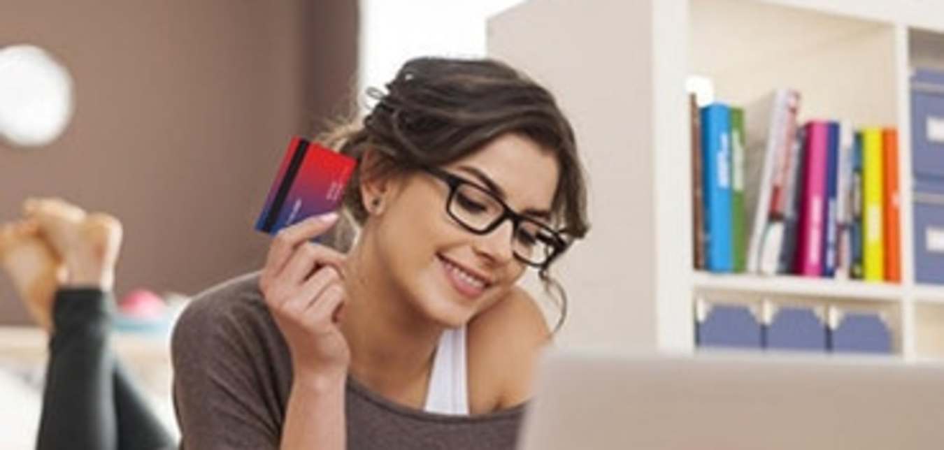 woman on her computer comparing AAA Membership plans