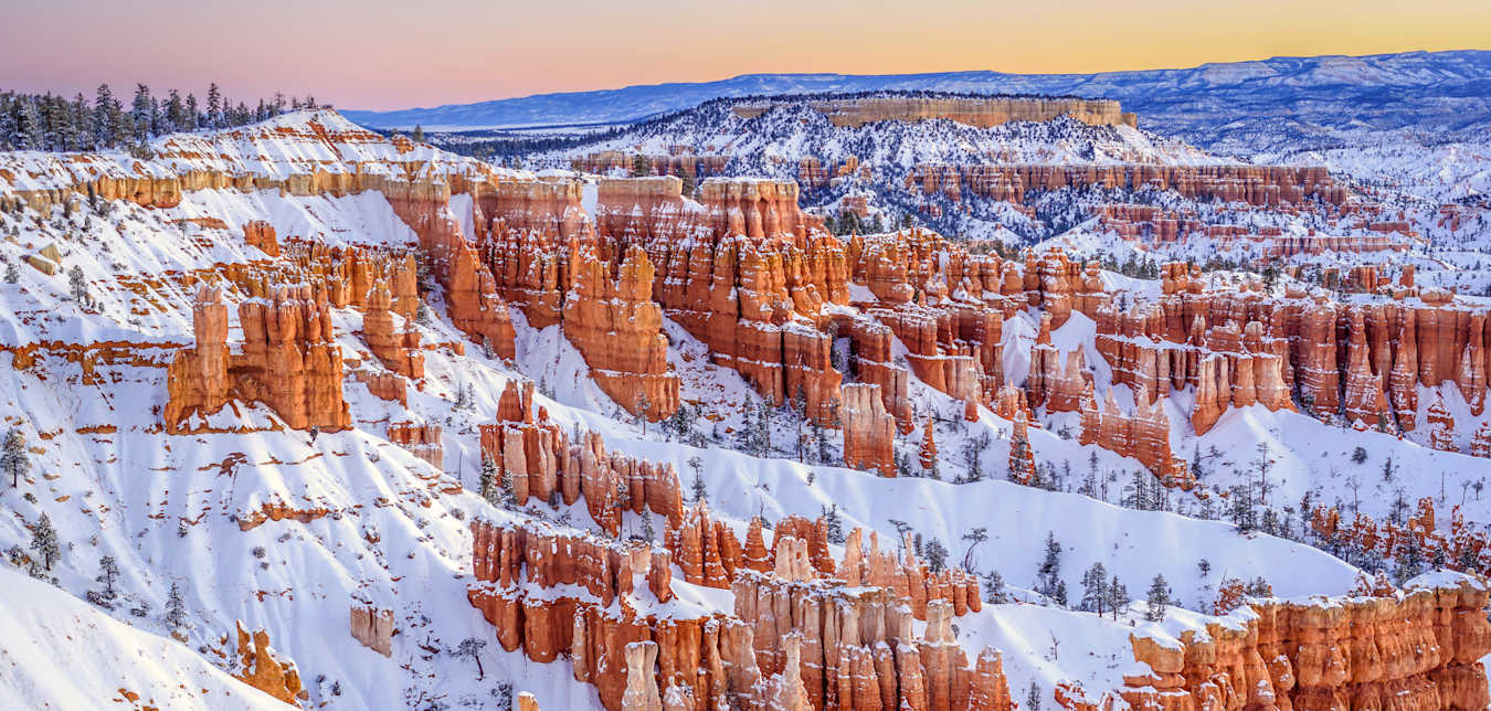 Hoodoos in Bryce Canyon National Park covered in snow.