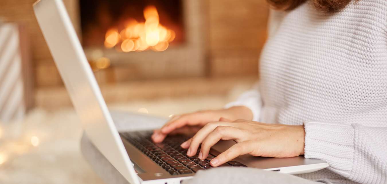 A person signs up for Via's AAA Highlights and eVia newsletters on their laptop.