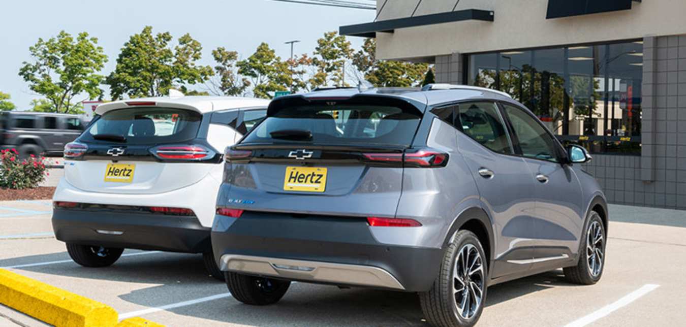 Cars in front of Hertz building