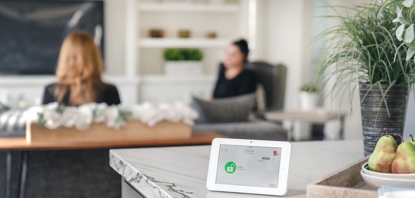 A control panel sitting on white countertop at home.