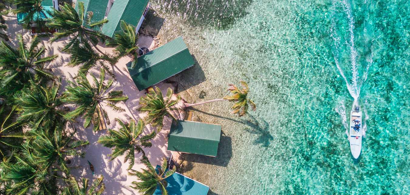 cabanas on beach in belize