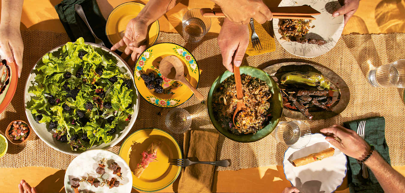 Beautiful dishes spread across a table from Wahpepah’s Kitchen in Oakland, California.