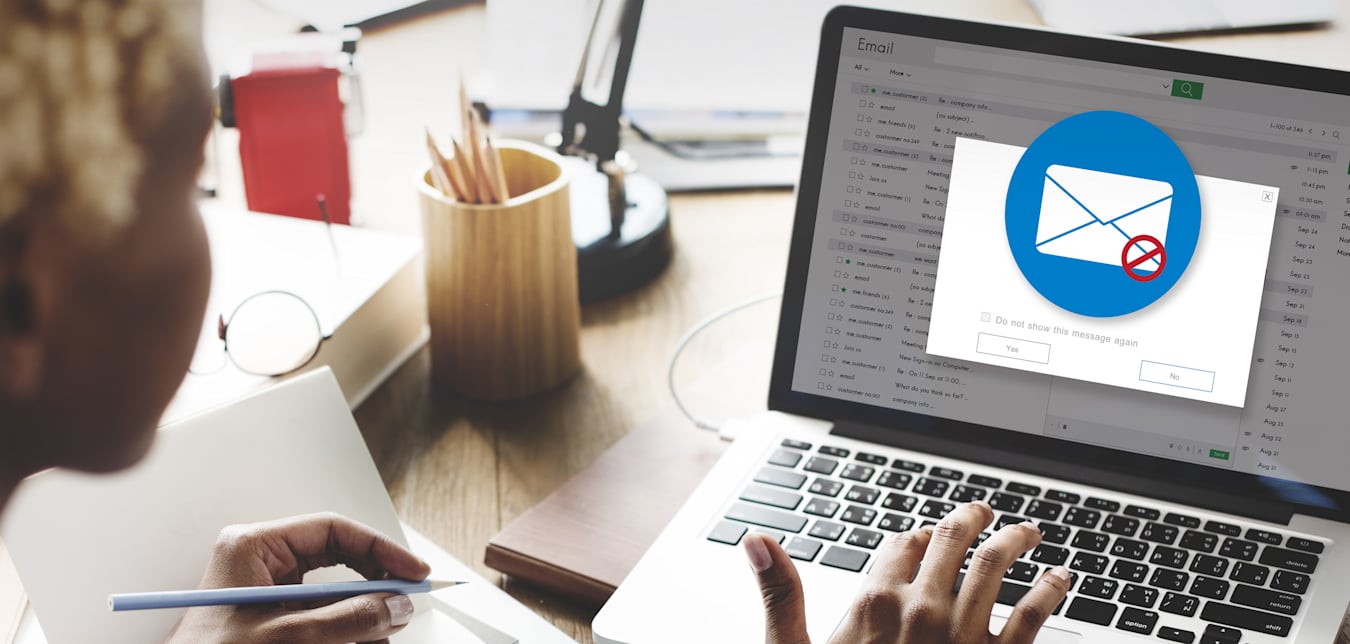 A person clears phishing emails out of their inbox.