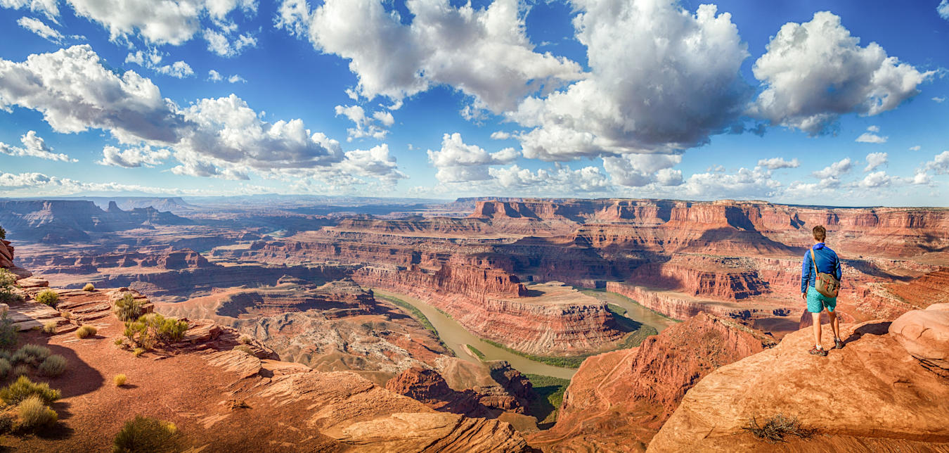 A visitor overlooks Dead Horse Point State Park in Utah.