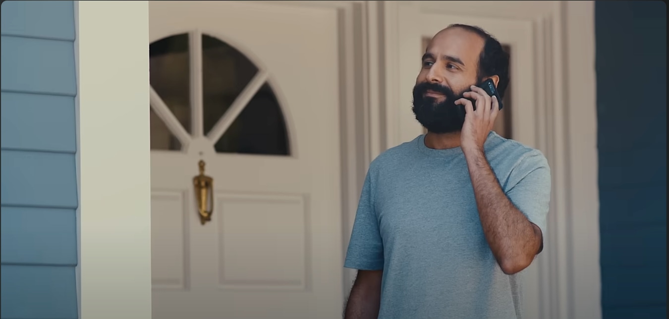 a screenshot from the AAA Insurance video,  Paperboy.