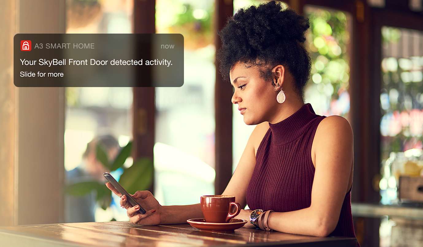 Woman reading phone notifications