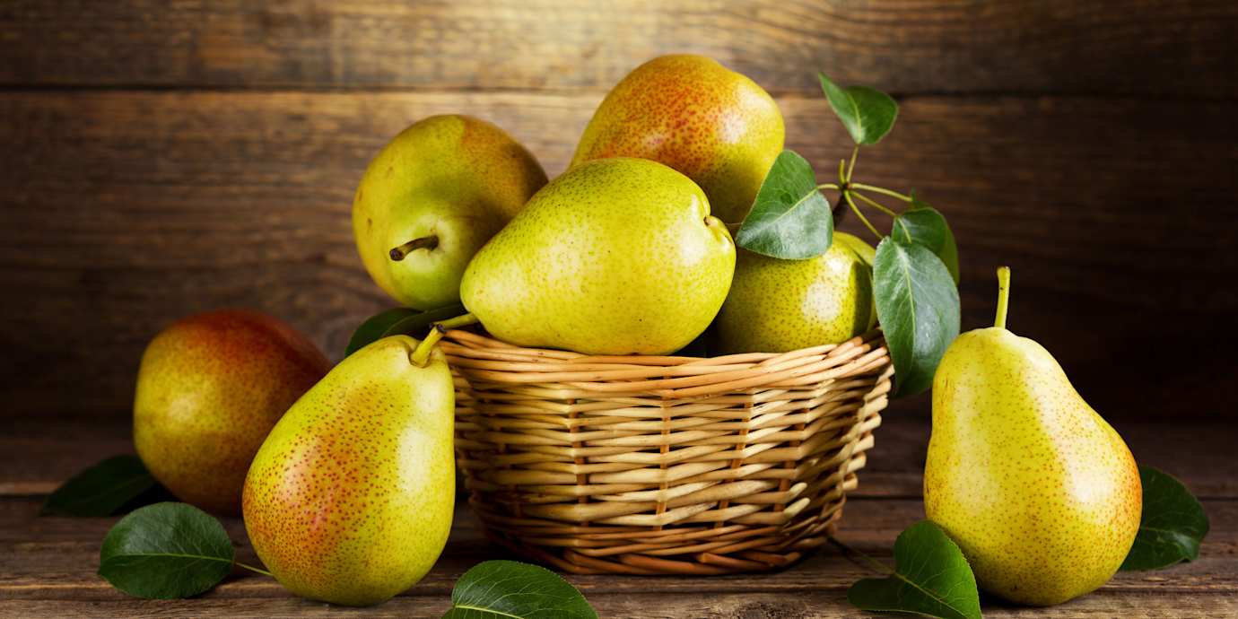 Pears in a wicker basket.