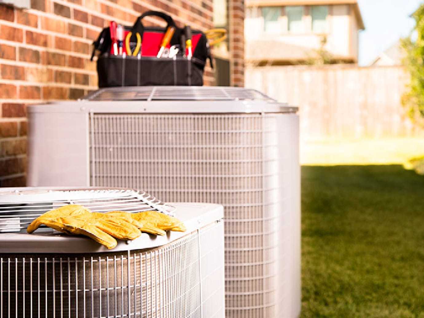 Person using thermostat