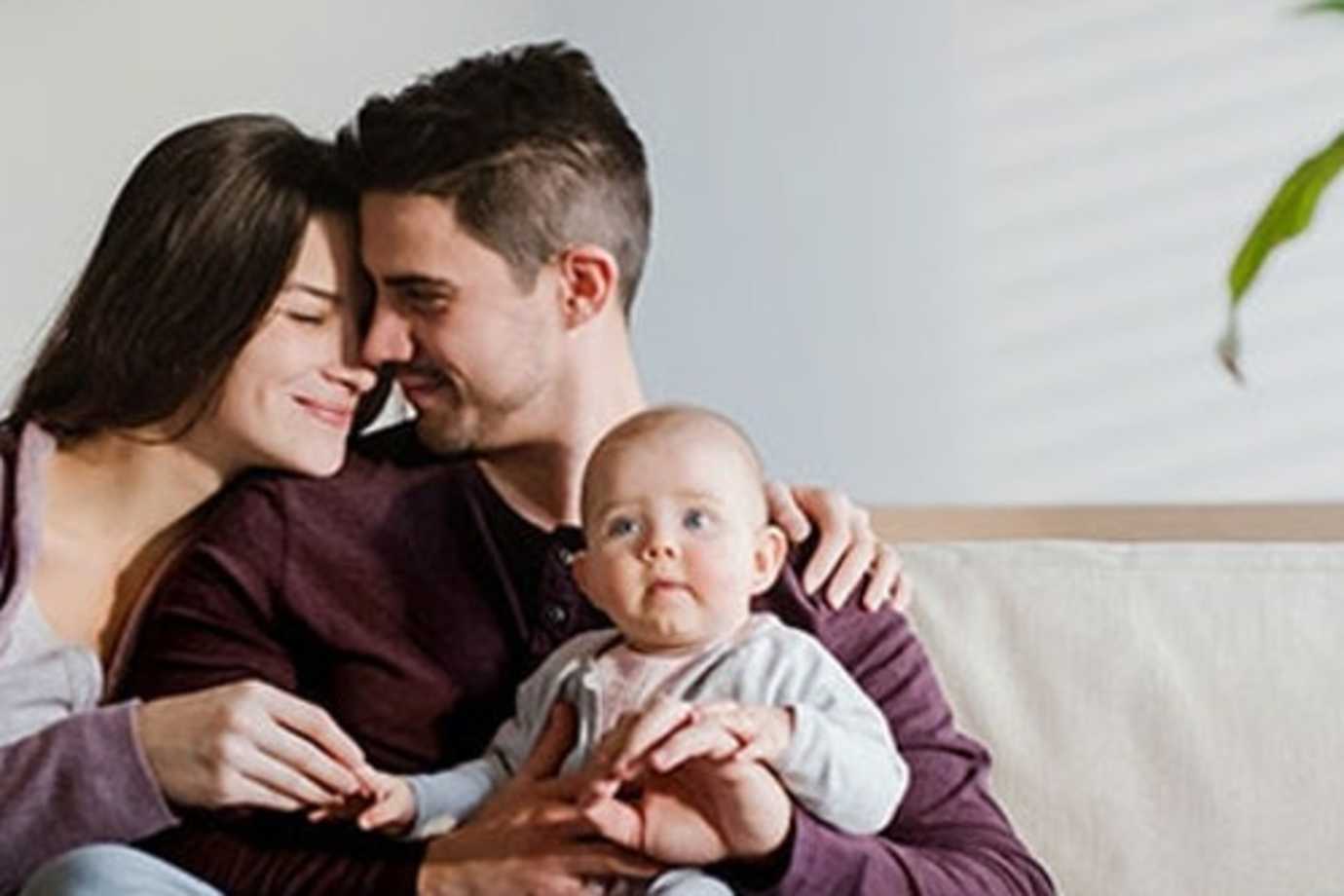 a young family settles into their new home with AAA Insurance