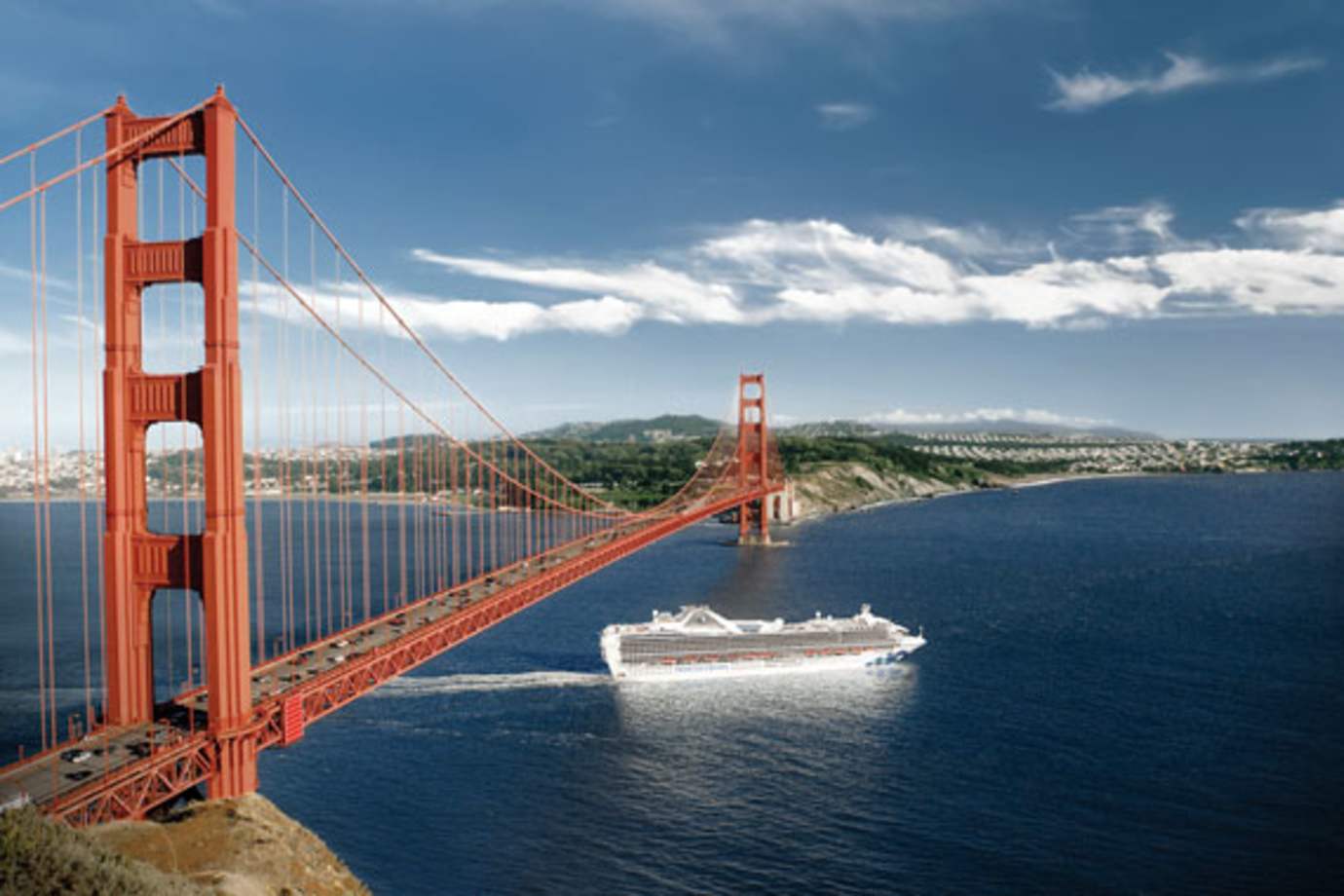 princess cruise ship sailing under golden gate bridge