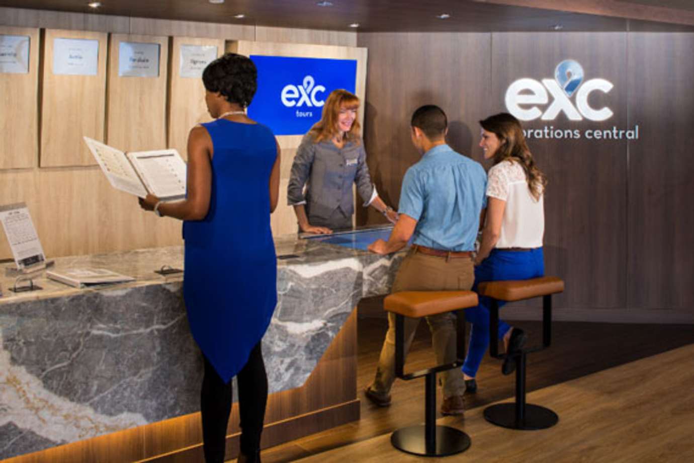 people at explorations central desk