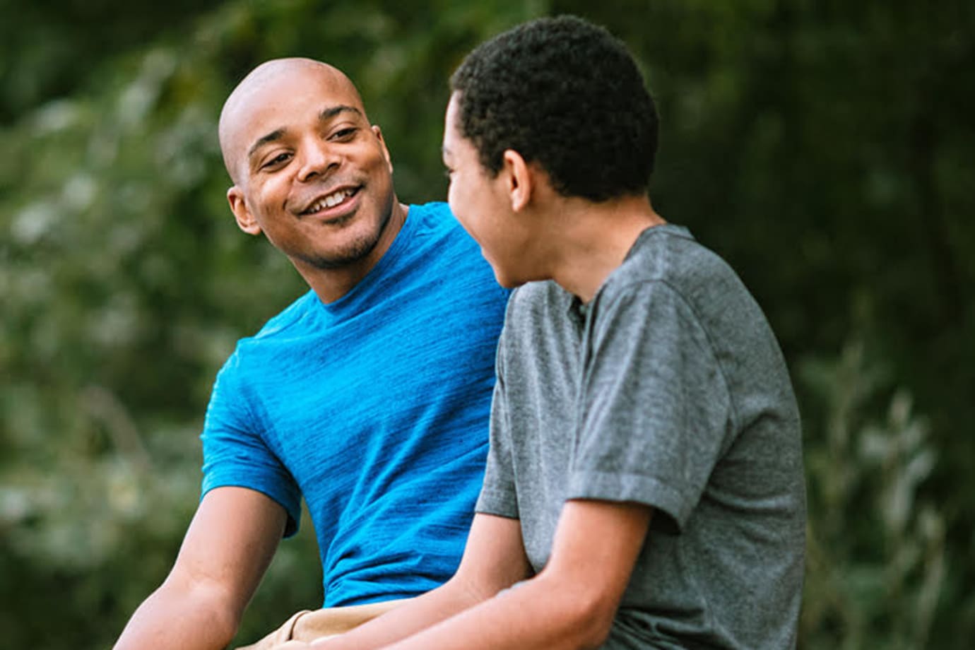 A father talks to his son about AAA Membership