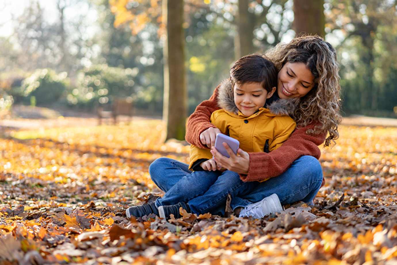 A mother with AAA Membership plays with her son