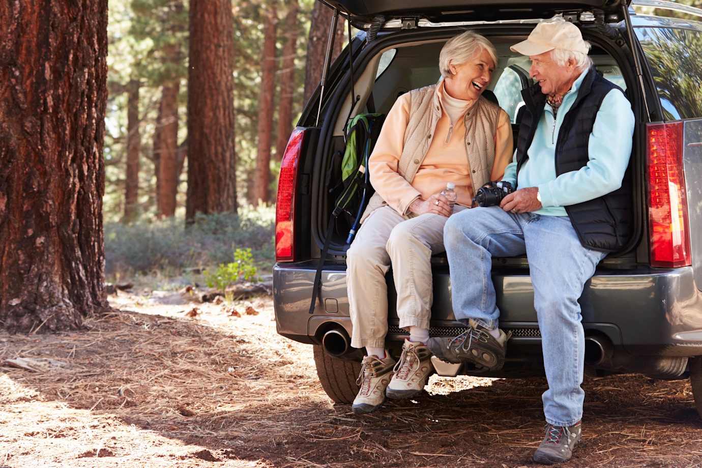 a aaa universal life insurance customer plays baseball with his son