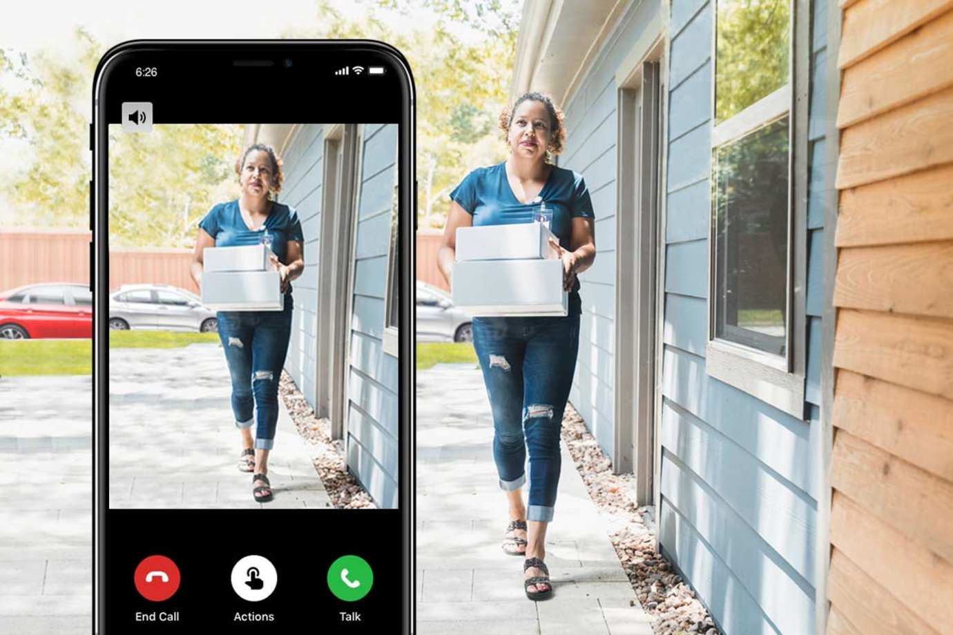 Person at front door on phone