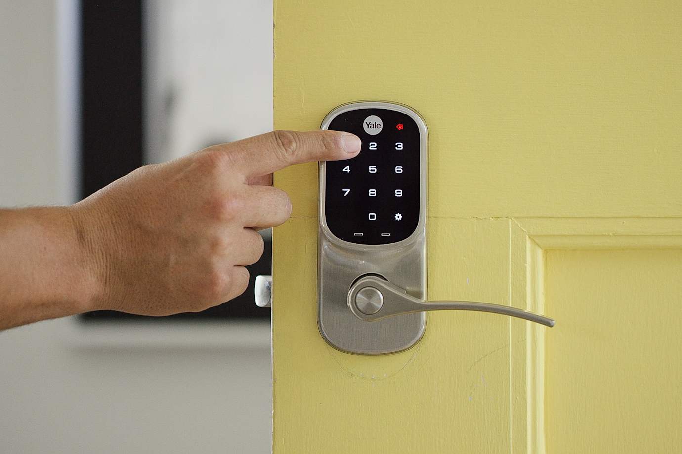 Person using smart door lock