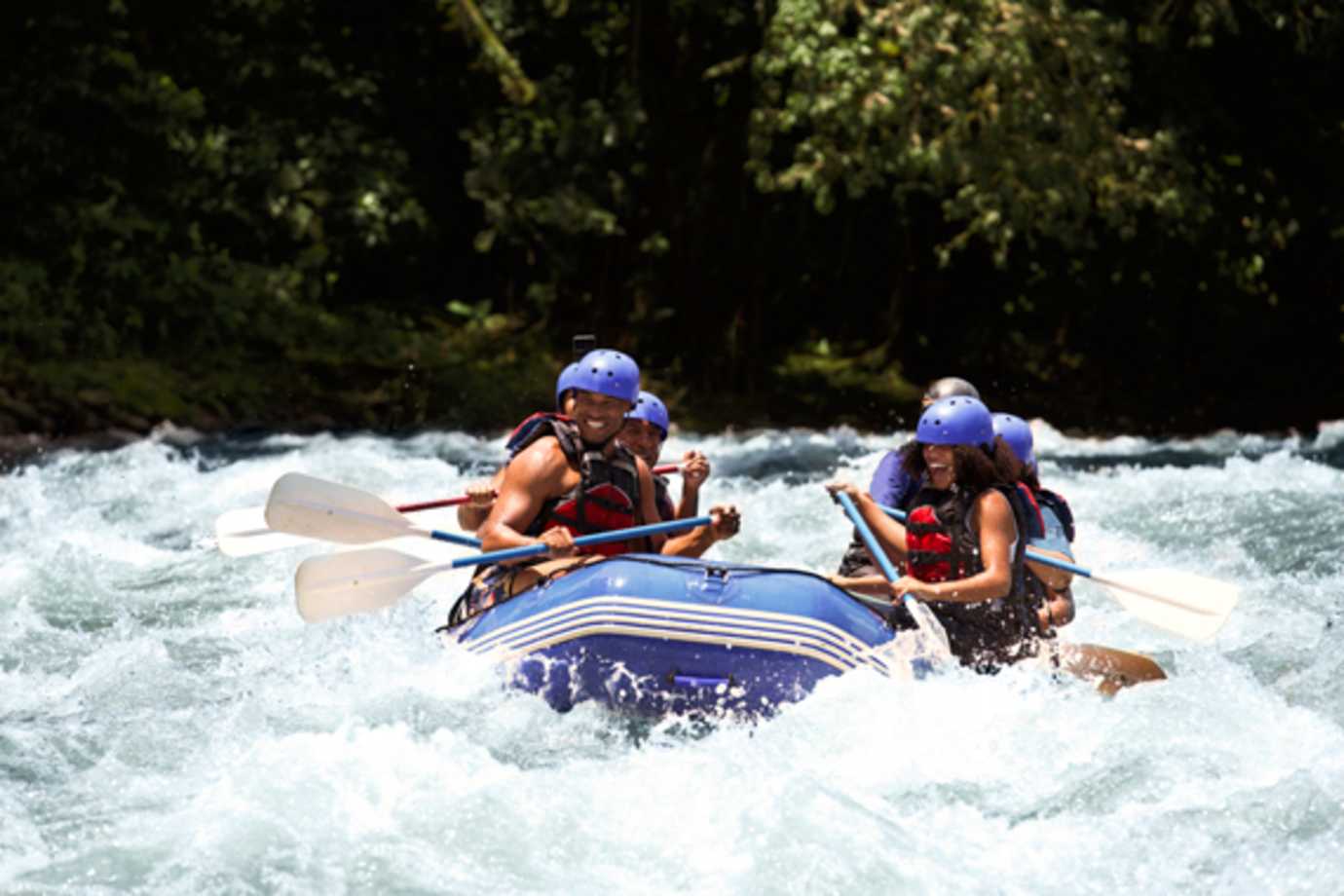 family rafting on an adventures by disney vacation in costa rica