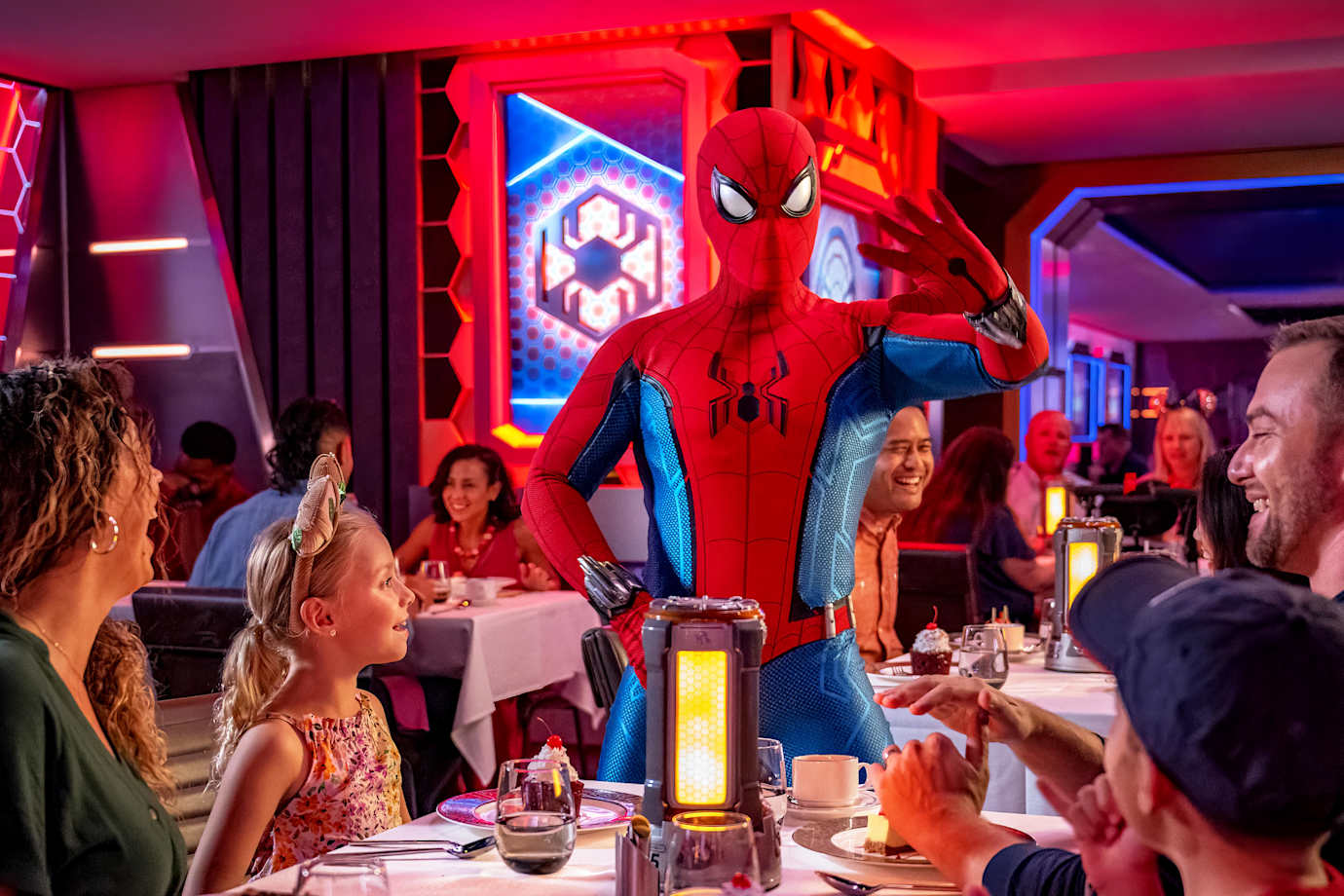 spiderman greets diners at world of marvel restaurant on disney treasure