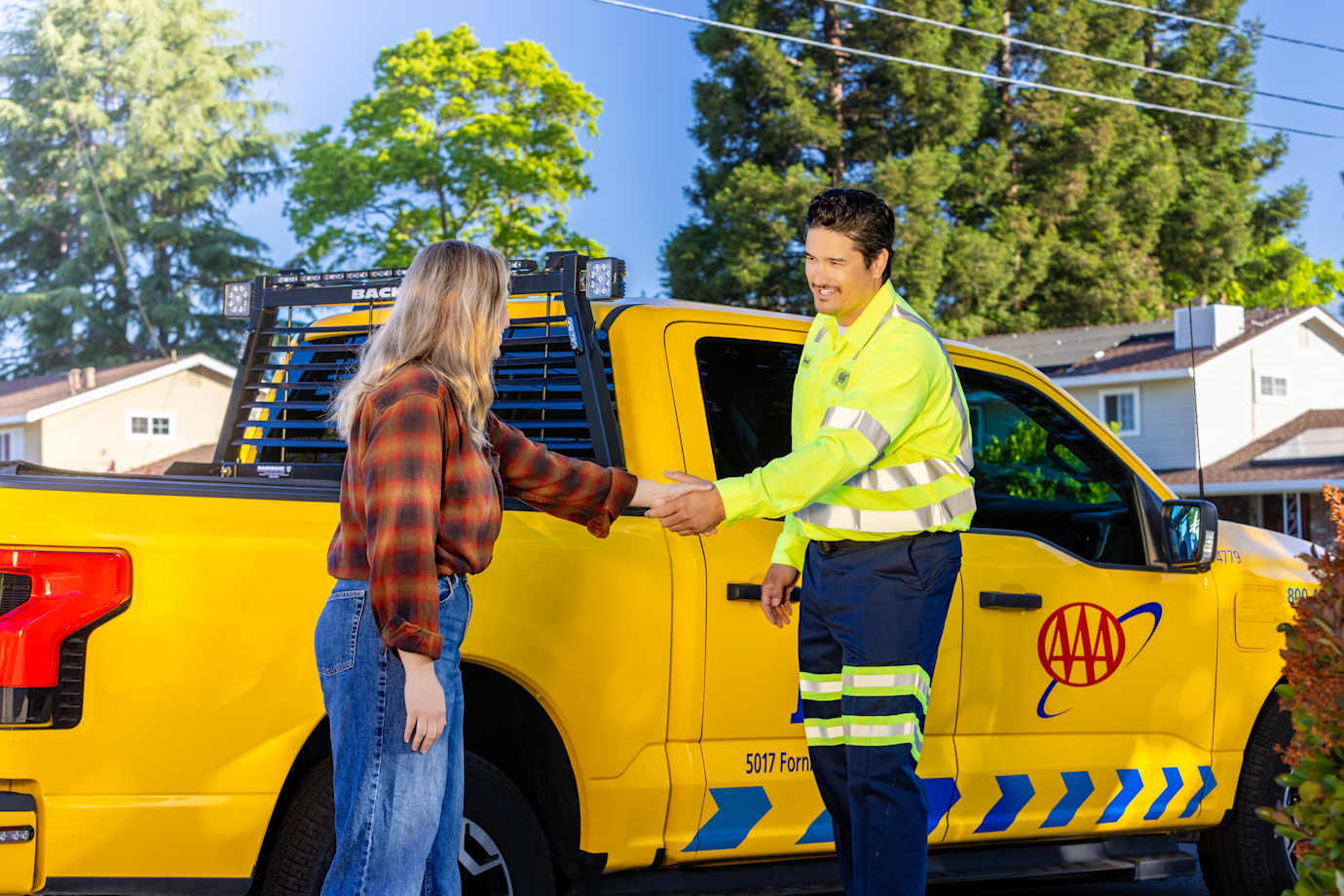 AAA roadside technician helps a Member get on the road again