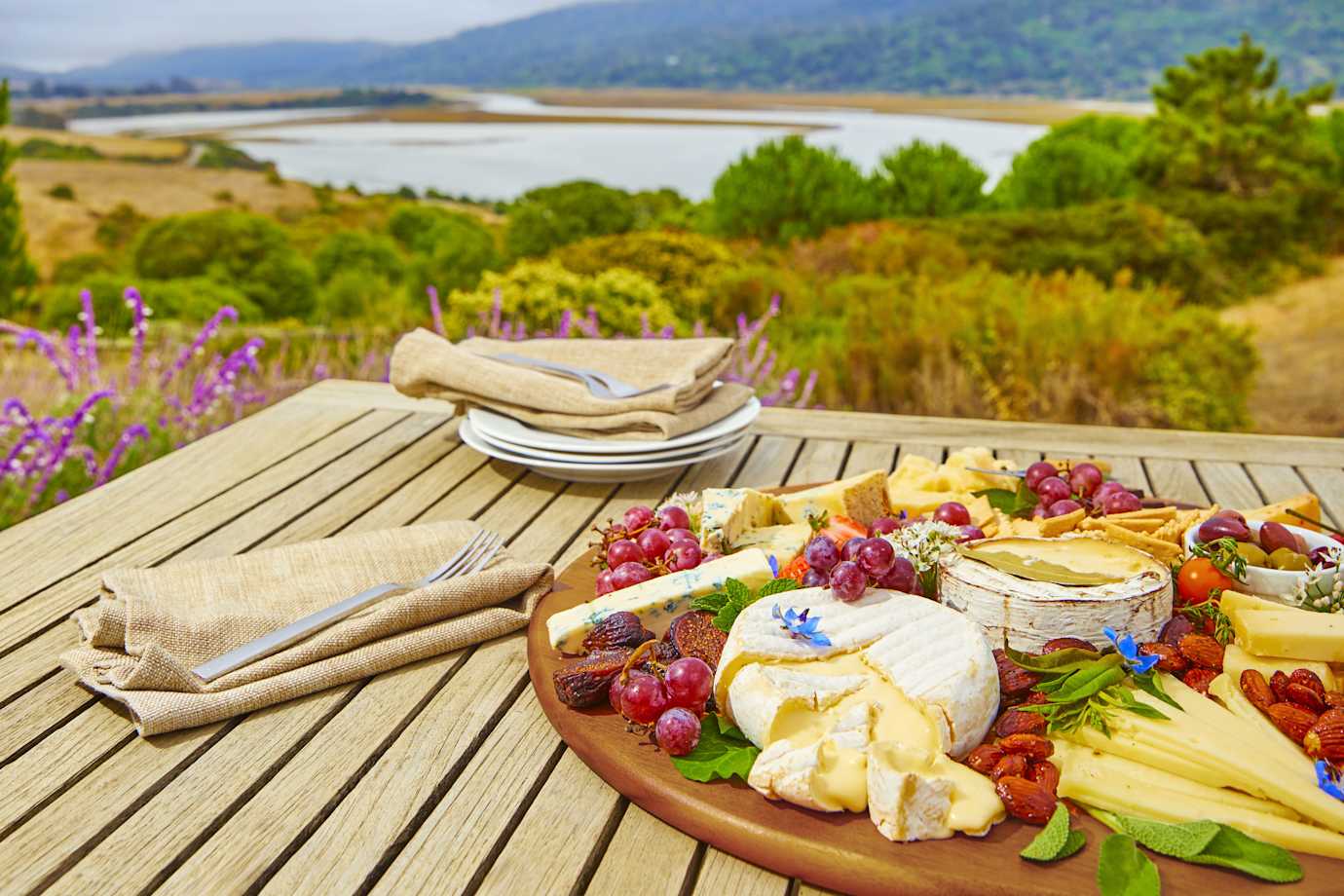 Cheese from Point Reyes Cheese on a platter by the water in California.
