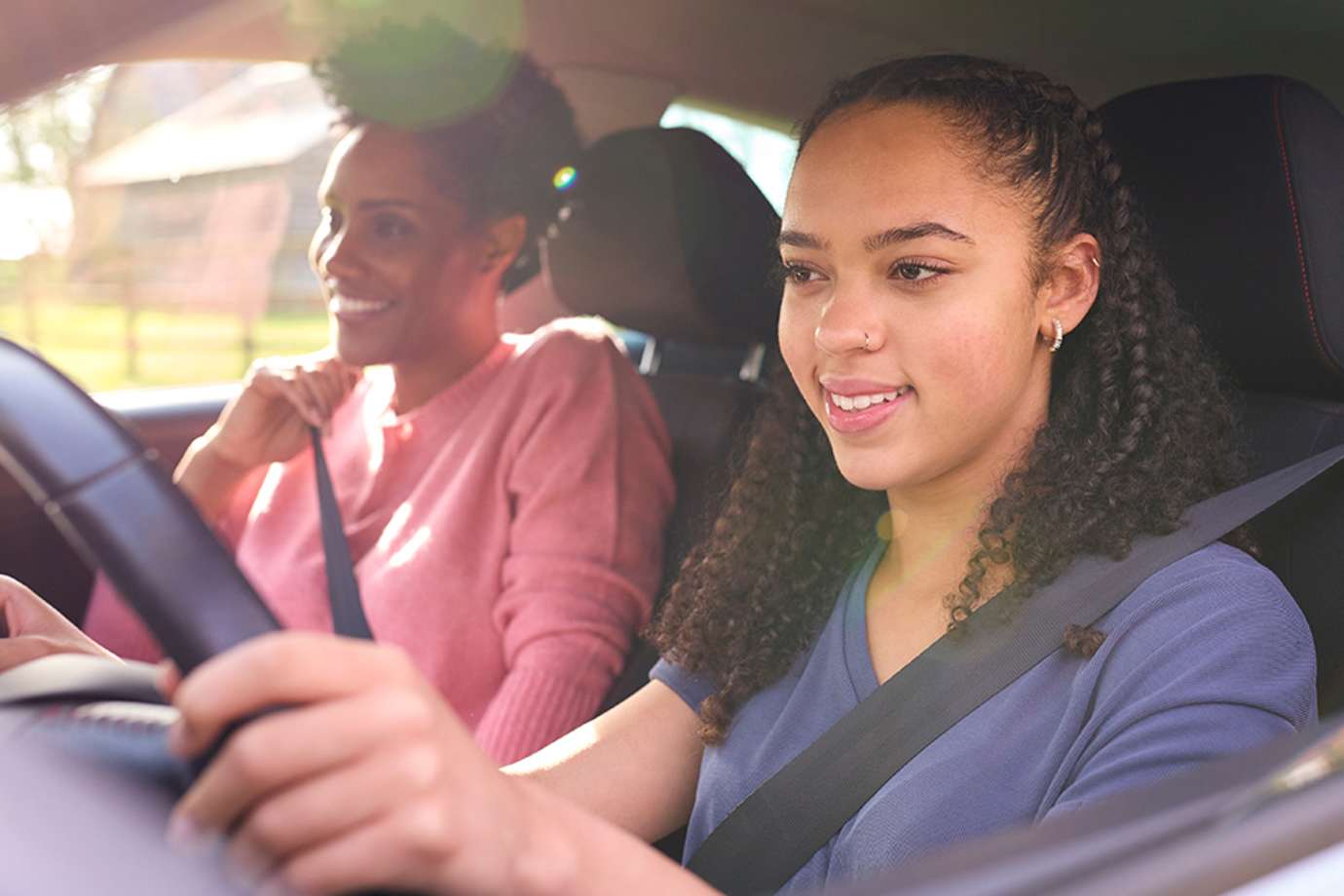 a teen drives a car safely after the teenSMART program