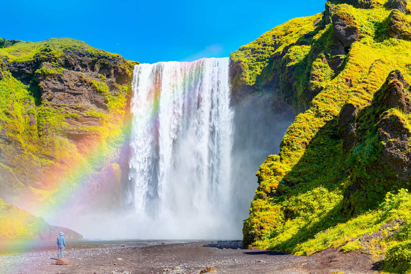 waterfall with rainbow in iceland