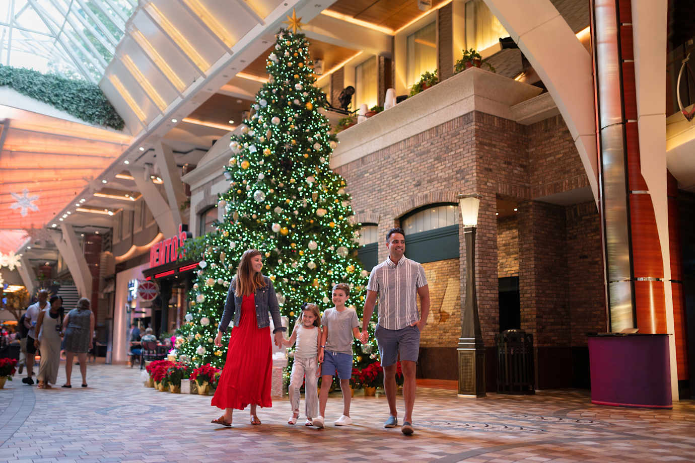family and christmas tree on royal caribbean ship