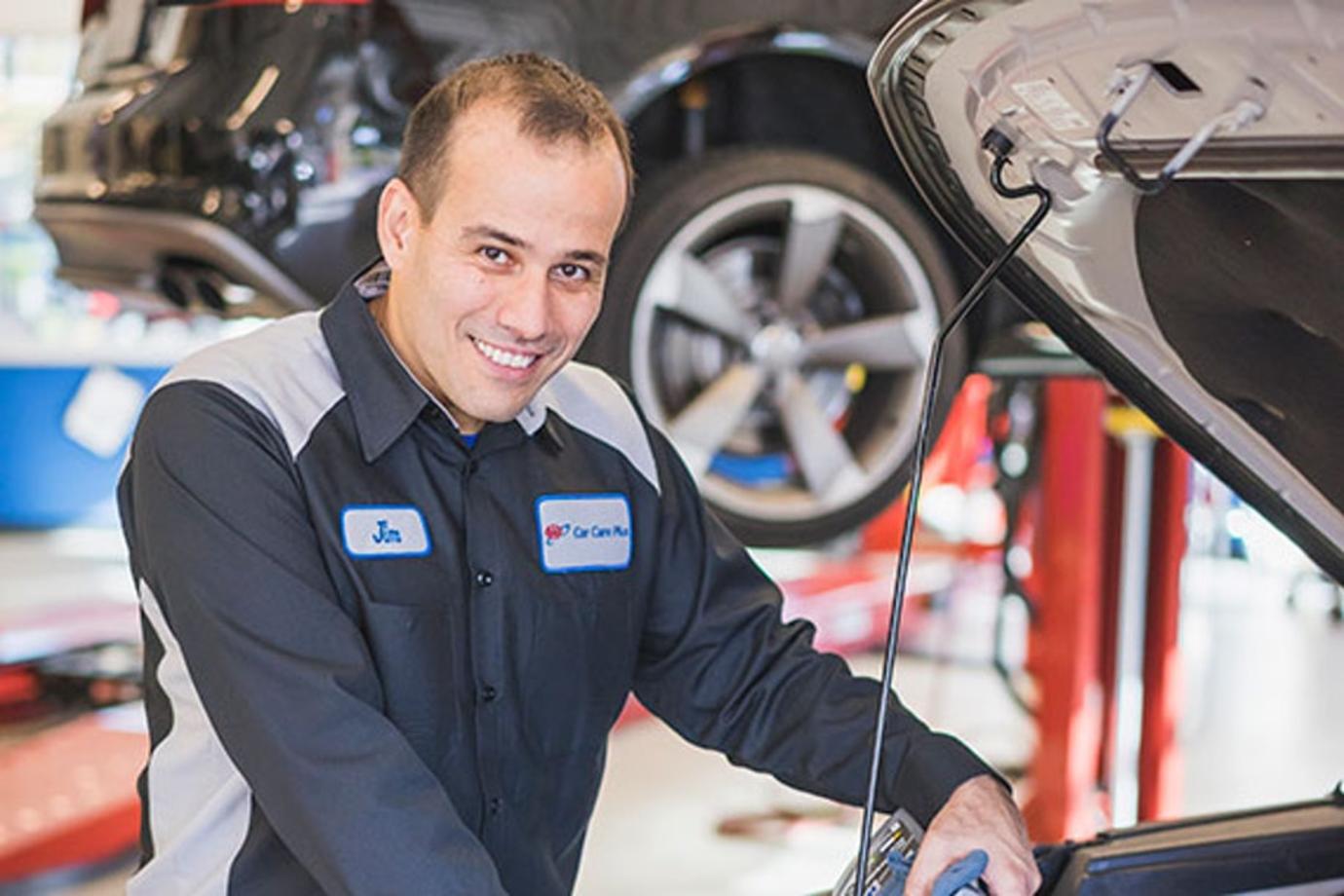 AAA mechanic repairs car in AAA body shop
