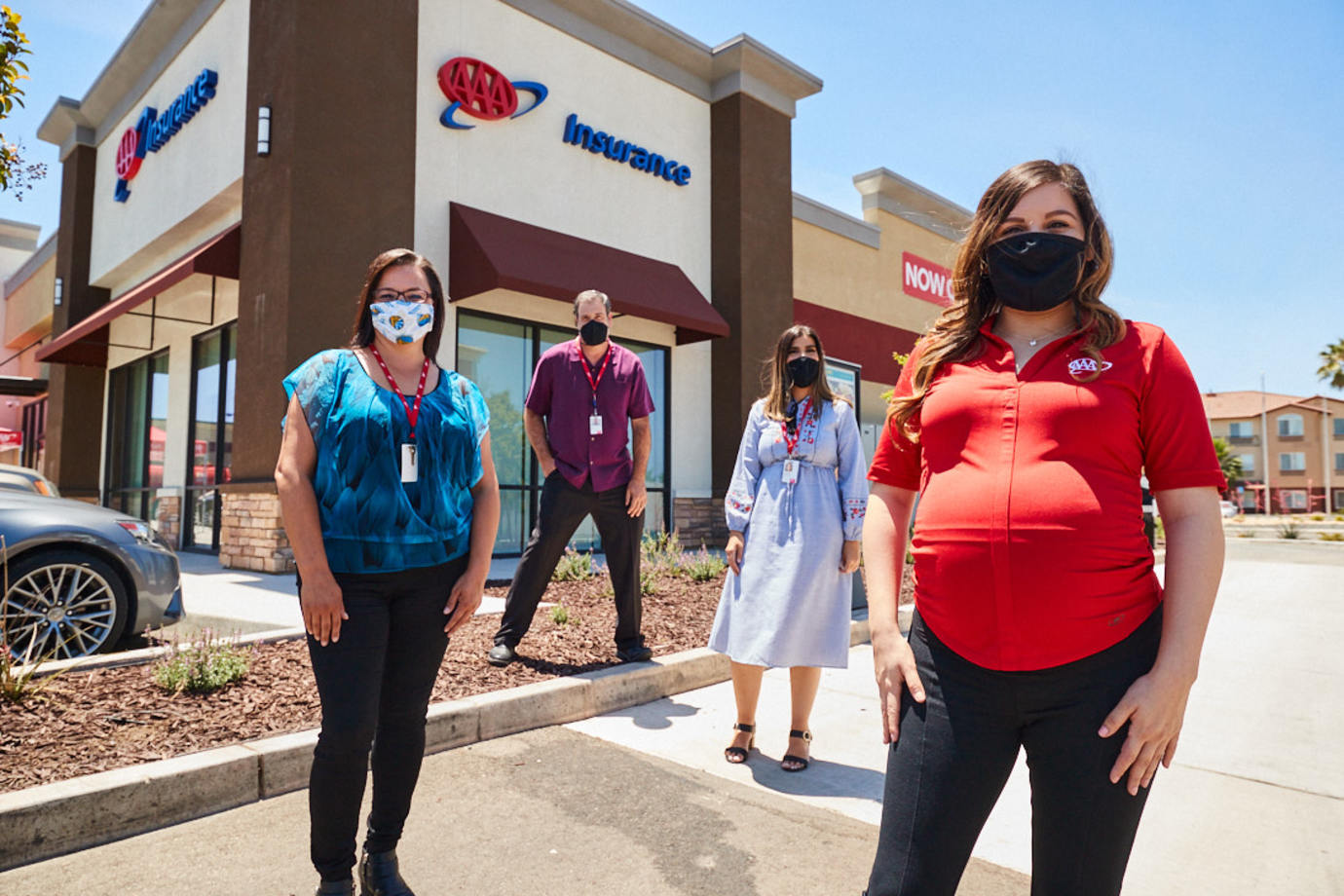 AAA employees outside of a local branch.