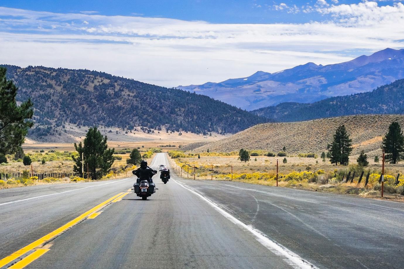 Motorcycles cruise on the open road